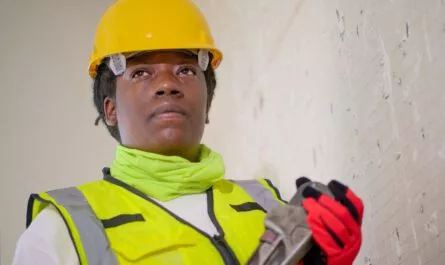 Handywoman Holding a Plumbers Wrench
